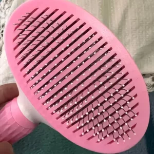 Perie pentru îndepărtarea părului de câine cu auto-curățare primită de la clientul T***r.