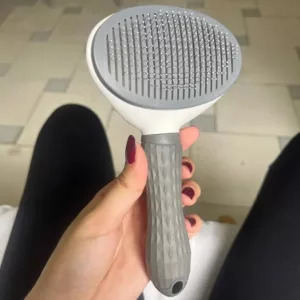 Perie de îndepărtare a părului de câine cu auto-curățare primită de la clientul S***m.